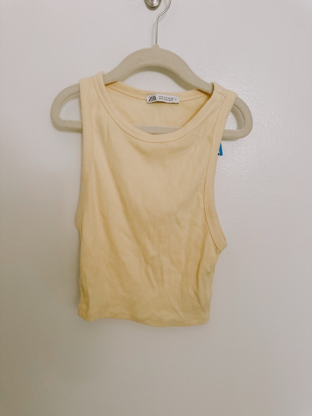 2 ZARA Sleeveless Crop Tank. Butter yellow ribbed and blue turtle neck crop tank